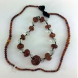 Two amber bead necklaces