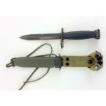 A US Army knife bayonet in scabbard. Blade length 17cms