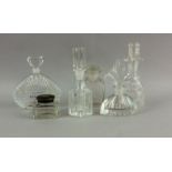 5 glass perfume bottles and an ink well