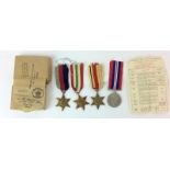 A WW2 medal group of four including the Africa and Italy Stars the Army Council medal certificate