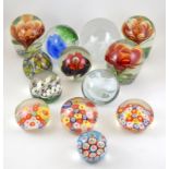 A collection of 12 paperweights