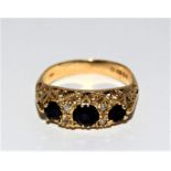 An Antique 9ct gold diamond and sapphire ring. Size L