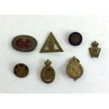 An interesting collection of seven WW1 & WW2 civilian worker lapel badges including War Munition