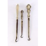 3 Silver handled button hooks