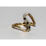 9ct gold diamond and sapphire S shaped ring. size J