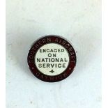 A rare WW2 chrome and enamel lapel badge Engaged On National Service Southern Aircraft Gatwick.