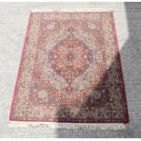 Keshan Wool Rug with red and blue pattern 200 x 145cm