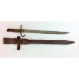 A Japanese Arisaka bayonet in an unusual leather scabbard and frog having a blade length of 395cms