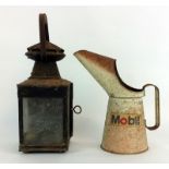 Railway lantern and a Mobil Oil jug