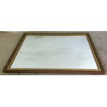 Gilt framed bevelled edged mirror. 135 x 105cm