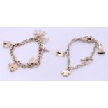 2 Ladies silver charm bracelets and charms