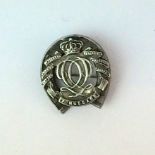 A WW1 HM silver 7th Hussars lucky horseshoe sweetheart brooch 3cms x 3 cms approximately