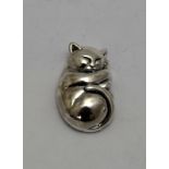an unusual silver cat in the form of a pendant necklace