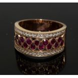 an 18ct rose gold ruby and diamond ring