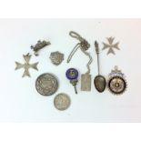 Assorted silver items including an ingot and medals 140gms