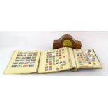 Collection of World stamps and an Edwardian inlaid clock