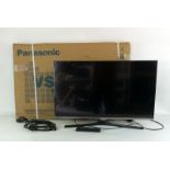 Samsung Tv and Panasonic TV Stand
