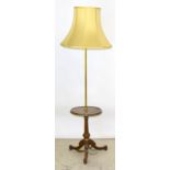 Standard lamp with serving collar on carved feet. 170cm