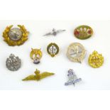 A small collection of 10 military sweetheart brooches and lapel badges including silver