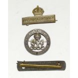 A WW1 No.4 Wound Stripe with an Imperial Service badge and a Services Rendered badge numbered