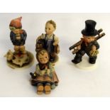 Four Vintage Goebel Hummel figurines. Boots, Farm Boy, Chinmey Sweep and Happy Passtime.