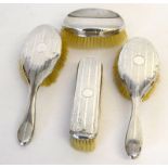 Collection of silver hairbrushes