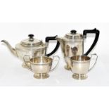 a silver four piece tea set. 1093g