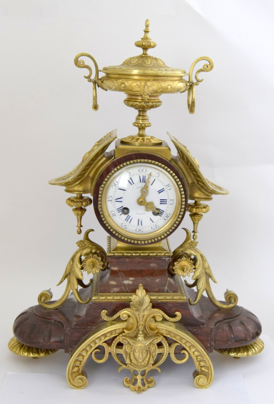 a 19thc French red marble mantle clock white dial blue numerals signed