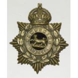 An original early 20th century two part helmet plate badge to the Hampshire Regiment. 11cms x