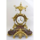 a 19thc french red marble mantle clock white dial blue numerals signed