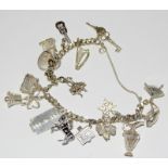 Silver charm bracelet and 16 charms