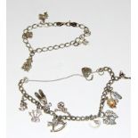 2 Silver charm bracelets and charms