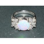 A Silver Cz And Opal Ring