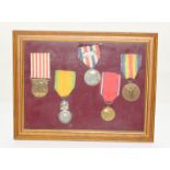 A framed and glazed group of five WW1 French medals including the Medaille Militaire - Victory Medal