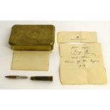 A clean example of a WW1 Princess Mary tin with bullet pencil and a Buckingham Palace printed letter
