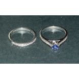 An 18Ct white gold Tanzanite And Diamond Ring With Matching Half Eternity Ring 1Ct Overall