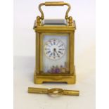 A Sevres Style Carriage Clock With Decorative Porcelain Panels
