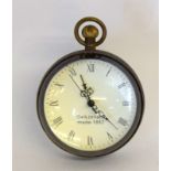 A Brass And Glass Ball Clock