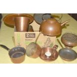 Eleven Kitchen copper items including lidded pans, kettle and candle holder