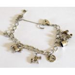 Ladies Silver charm bracelet and 8 charms