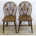 Two wheel back chairs