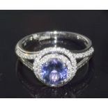 An 18Ct white gold Tanzanite And Diamond Halo Style Ring Of 1.6Ct"S