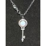 A Silver Cz And Opal Pendant Necklace