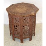 Middle Eastern Heavily carved octagonal fret work table. 55 x 55cm