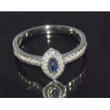 An 18Ct white gold Lozenge Shaped Sapphire And Diamond Ring Of 45 Points