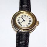 18ct gold Cartier Trinity wristwatch fitted with its original 18ct gold buckle In working order