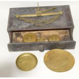 A Wooden Cased Set Of Antique Brass Weights