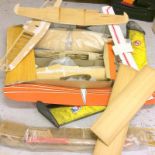 Collection of balsa wood planes and parts