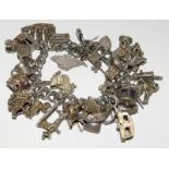 Ladies Silver charm bracelet and 35 charms