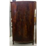 Bow front flame mahogany two door cupboard 150 x 80 x 60cm